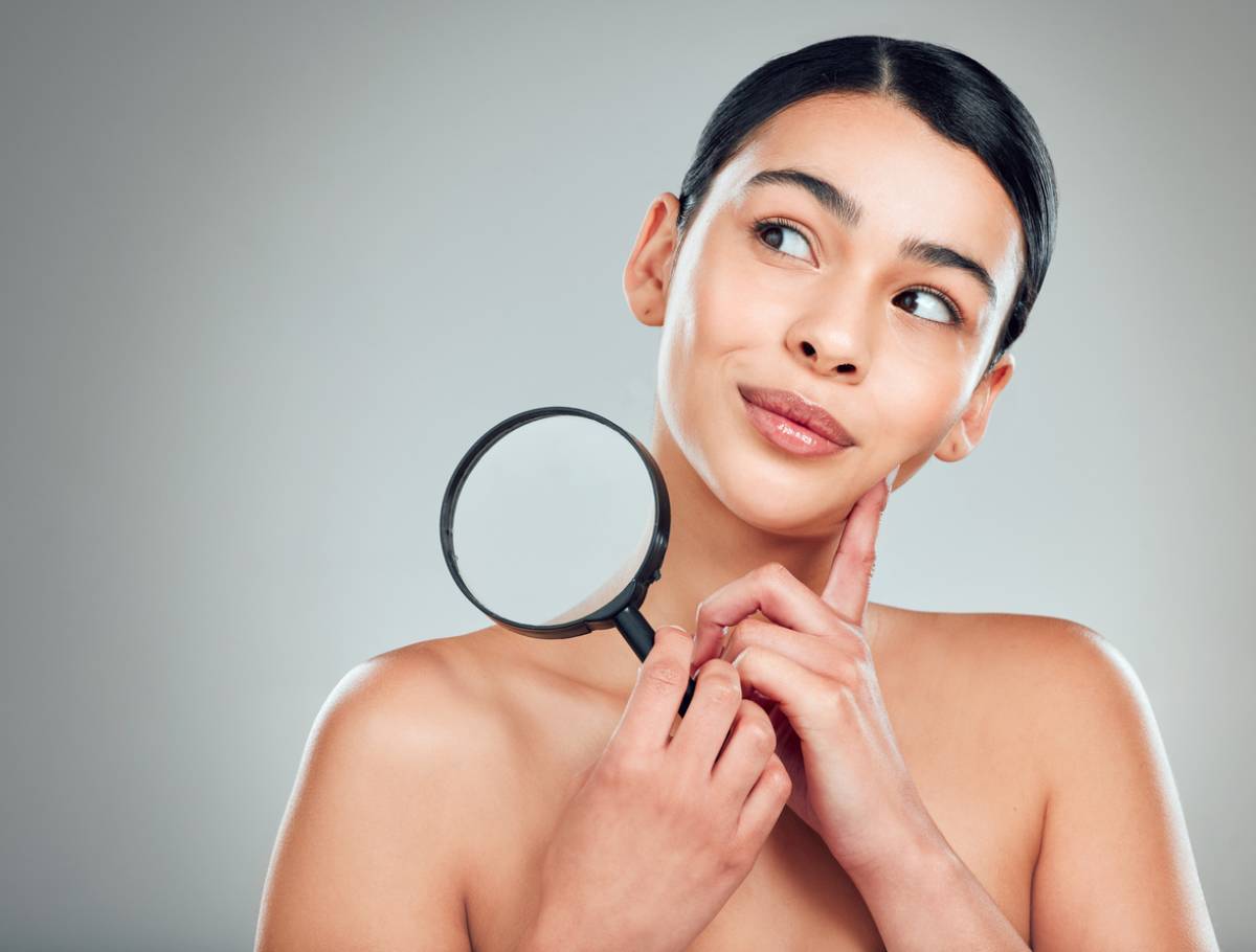 concept of woman wondering why our skin starts to sag